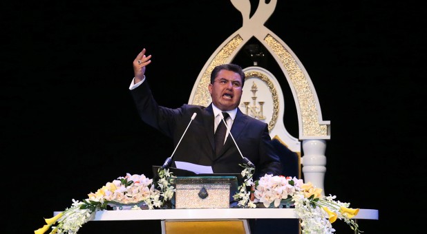Naason Joaquin Garcia, the spiritual leader and international director of The Light of the World Church, gestures as he leads the prayer session at Mexico City Arena in Mexico City.