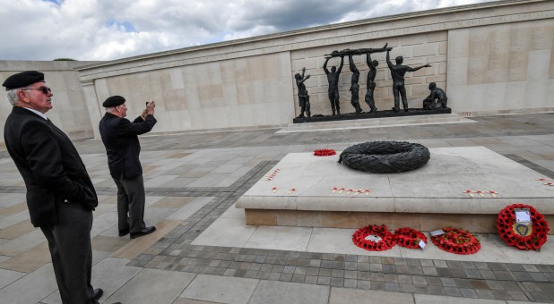 Veterans view the World War II Memorial.
