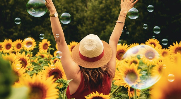 2020 05 photography of woman surrounded by sunflowers 1263986
