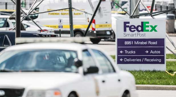 Investigators are on the scene following a mass shooting at a FedEx facility in Indianapolis, Friday, April 16, 2021. The shooting took place late Thursday evening at the FedEx Ground Facility near the Indianapolis International Airport.