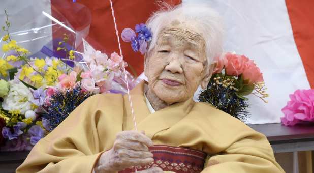 Kane Tanaka, born in 1903, smiles as a nursing home celebrates three days after her 117th birthday in Fukuoka, Japan, in this photo taken by Kyodo January 5, 2020.