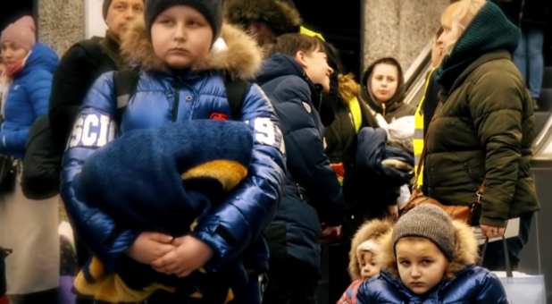 Ukrainian children, now refugees because of the Russian invasion