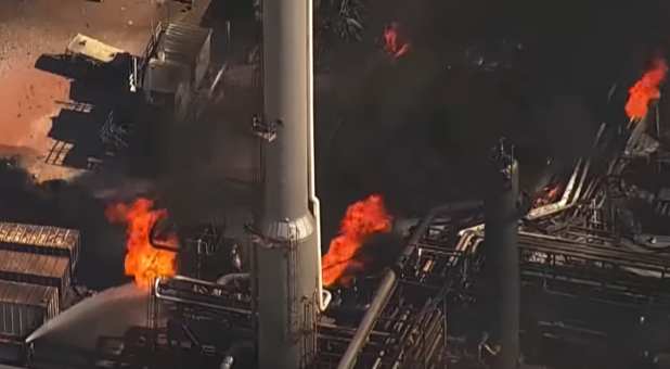 Fire burns at the plant in Medford, Oklahoma,