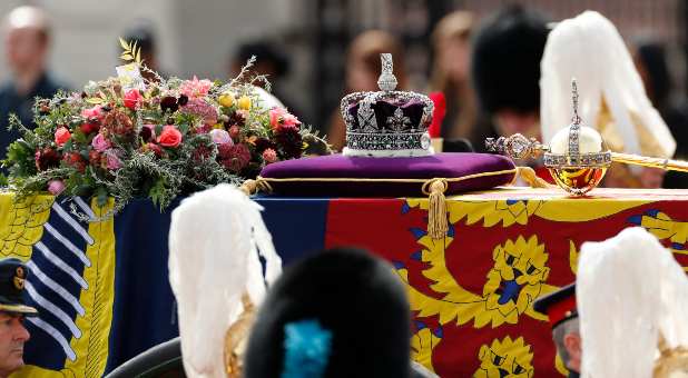 The Imperial State Crown rests on the coffin of Britain's Queen Elizabeth during the funeral procession, on the day of the state funeral and burial of Britain's Queen Elizabeth, in London, Britain, September 19, 2022.