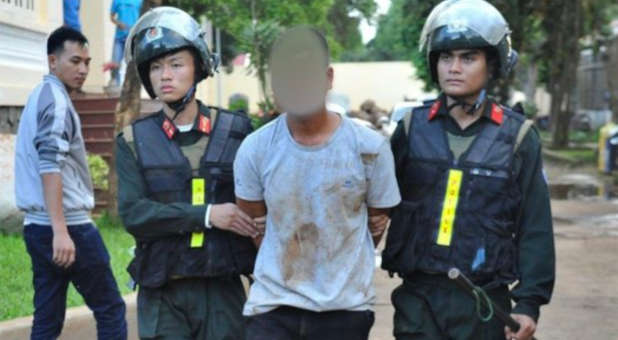 Vietnamese Christian arrested by police force.