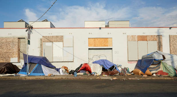 Row of homeless tents in the city.