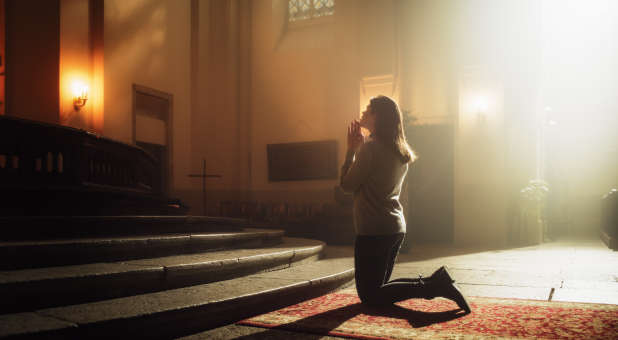 praying at altar