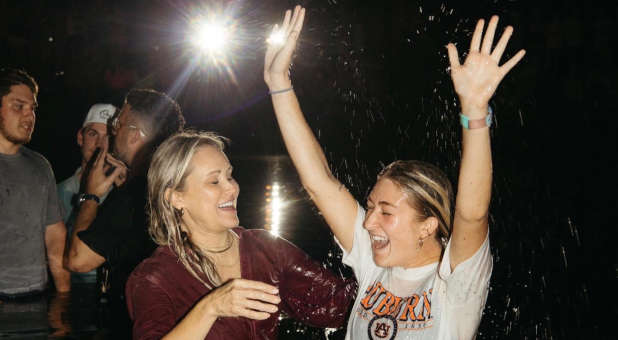 Rejoicing after baptism at Auburn University