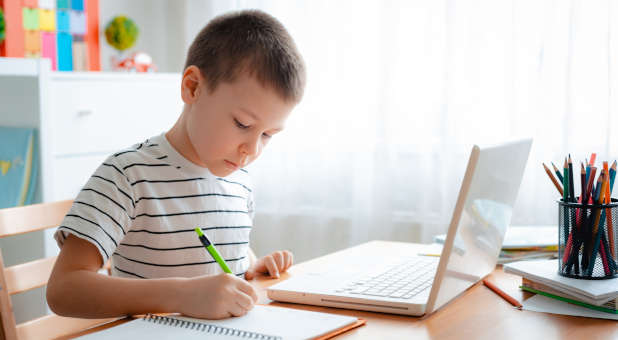 A boy learning at home.