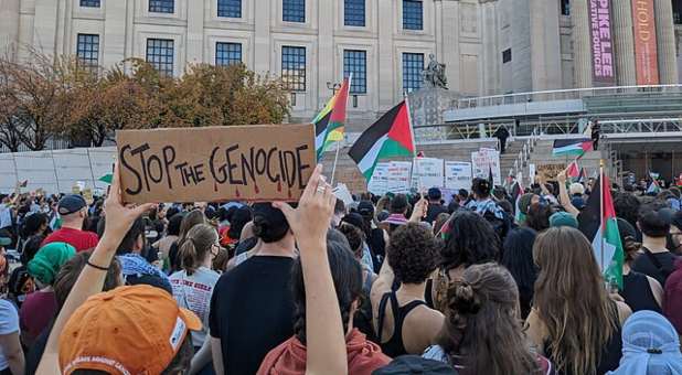 Pro-Palestine rally in Brooklyn, New York with sign