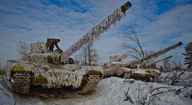 camouflaged tanks, part of anti-terrorist operation in Eastern Ukraine