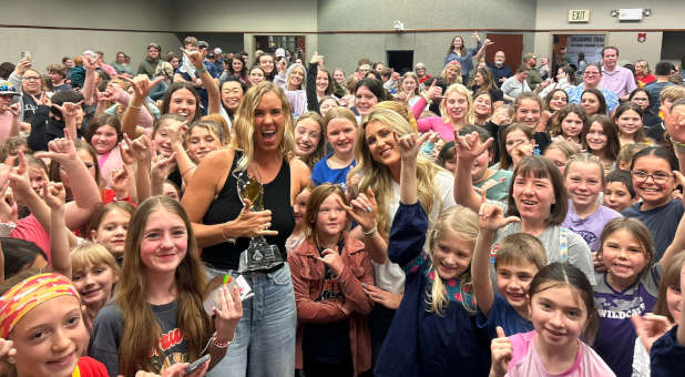 Riley Gaines and Bethany Hamilton with young girls at the Brave Books event.