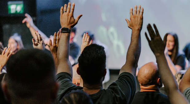 People praising God in a church service.