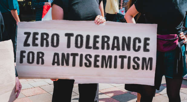A sign denouncing antisemitism.