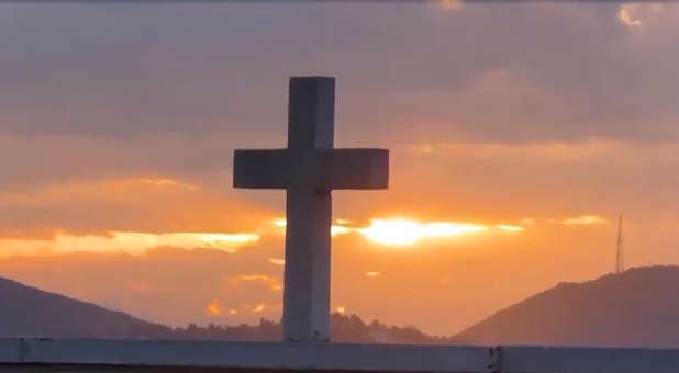 A Cross in Israel at sunset.