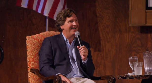 Tucker Carlson speaking at a Texas GOP event.