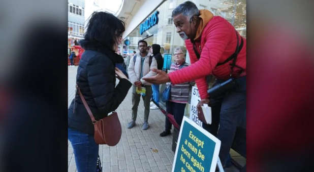 UK pastor holding street conversations.