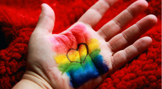 Hand with Rainbow Paint