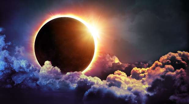 solar eclipse and clouds