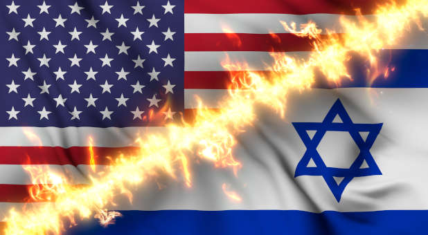 The flags of the United States and Israel separated by fire.