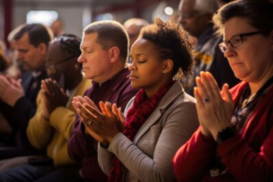 Grady Church people praying FIMB Adobe 398x266 1